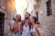 © Novak - Happy friends tourist on a vacation