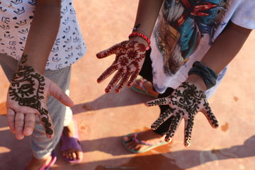 India style Henna on brightly colored child's hand