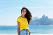 © Daniel Ernst - Smiling brazilian woman at Ipanema beach at Rio de Janeiro