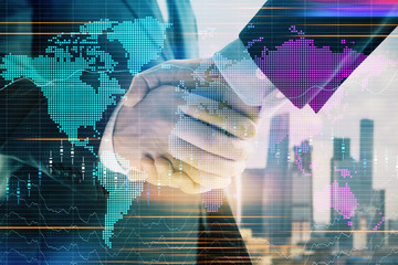 Double exposure of financial chart and world map on cityscape background with two businessmen handshake. Concept of international investment