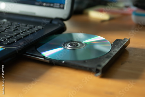 Fotomural CD in the laptop cd/dvd drive