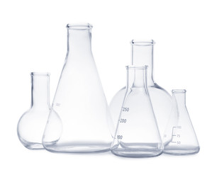 Set of empty laboratory glassware on white background