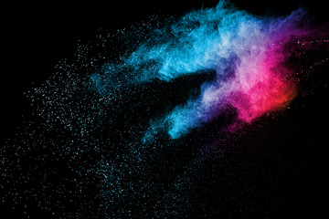 Wall Mural - explosion of colored powder isolated on black background. abstract colored background. holi festival