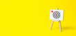 Leinwandbild Motiv Sign stand with an arrow in the target on a yellow background. Hit exactly on center. Tactics of advertising targeting. advertise campaigns. Goal Achievement and Purposefulness