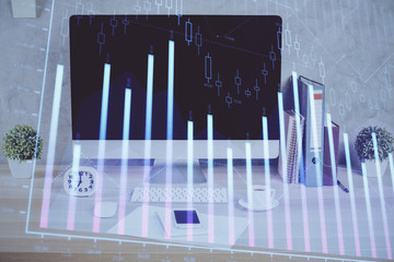 Forex graph hologram on table with computer background. Double exposure. Concept of financial markets.