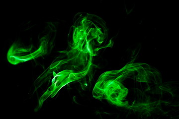 Green smoke on black background