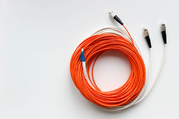 Orange and white optical cable patch fiber isolated on white background