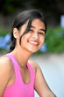 © dtiberio - An A Smiling Youthful Diverse Teenager