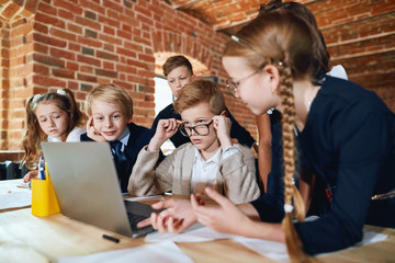 Wall Mural - clever children making a presentation, chatting online, having online lesson. education