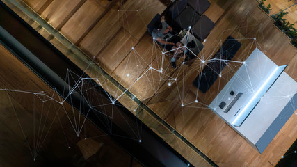 Poster - Above view of Hipster guy surfing network, connecting with people and shopping in data center.