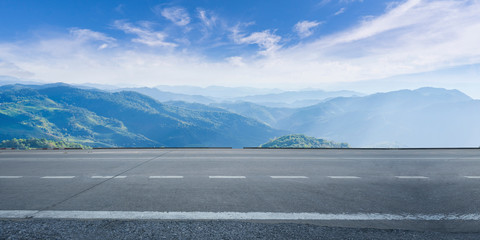 empty highway asphalt road and beautiful sky mountain landscape