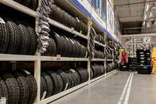 Rack With Variety Of Car Tires In Automobile Store