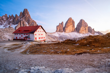 Beautiful sunset at Tre Cime di Lavaredo (Drei Zinnen) and rifugio Lacatelli , Dolomites, South Tyrol