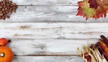 Poster - Autumn decorations in each corner of white rustic wooden boards for the holiday season