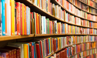 Library with many shelves and books, diminishing perspective and shallow dof