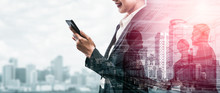Double Exposure Image Of Business Communication Network Technology Concept - Business People Using Smartphone Or Mobile Phone Device On Modern Cityscape Background.