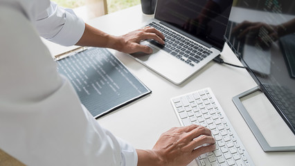 Programmer working in a software development and coding technologies. Website design. Technology concept.