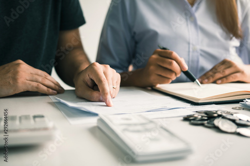 Fotomural Two asian couples and men and women are together analyzing expenses or finances in deposit accounts and daily income sources with an savings economical concept