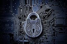 Computer Security Concept. Old Mysterious Padlock On Computer Circuit Board 