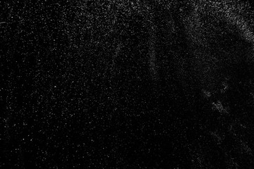 abstract real dust floating over black background for overlay