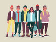 Group of young people dressed in trendy street style clothes. Girls and boys in fashionable outfits
