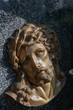Jesus Kopf auf einer Grabplatte in Spanien 