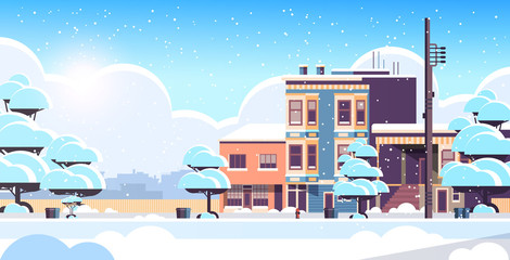 Wall Mural - city building houses exterior modern town snowy street in winter season sunset snowfall cityscape background horizontal flat