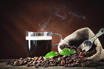 Wall Mural - Cup of breakfest coffee with coffee beans