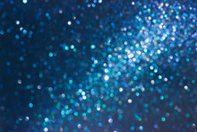 Brilliant Abstract Blurred Background. Blue Shiny Background For Your Text And Design. Can Be Used For Christmas Or New Year Theme Design. Defocused Abstract Background. Selective Focus.