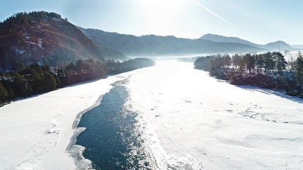 Wall Mural - Low flight over fresh cold mountain river. Altai, Katun river. 4k (UHD) aerial view. 