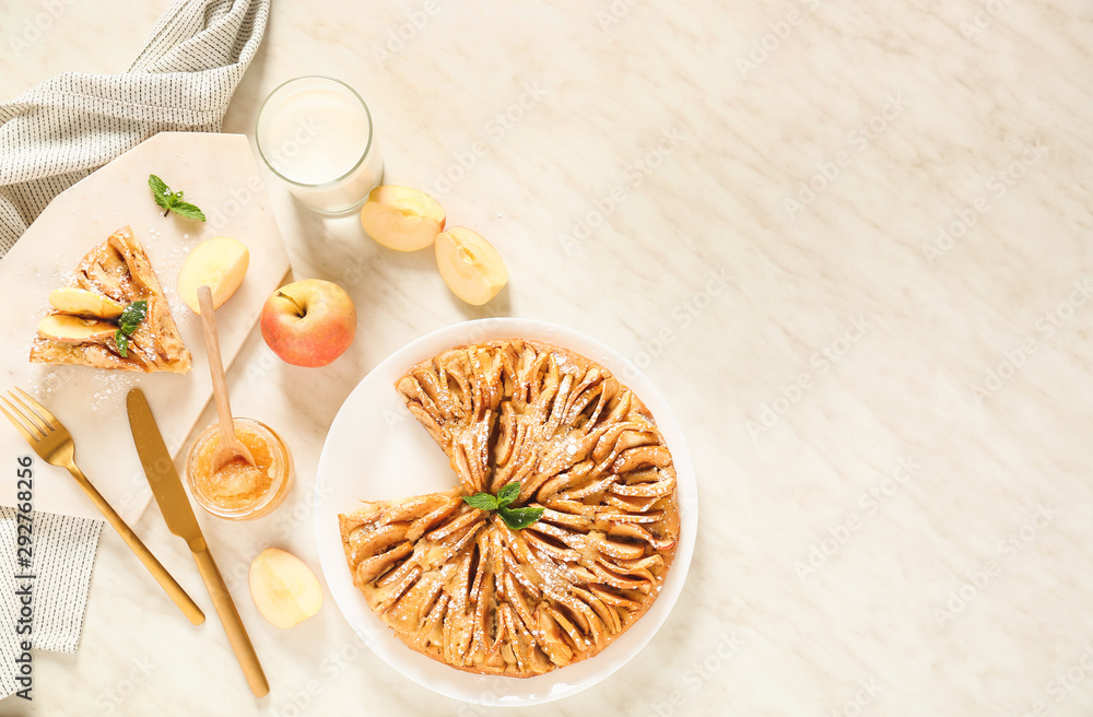 Composition with sweet apple pie on table