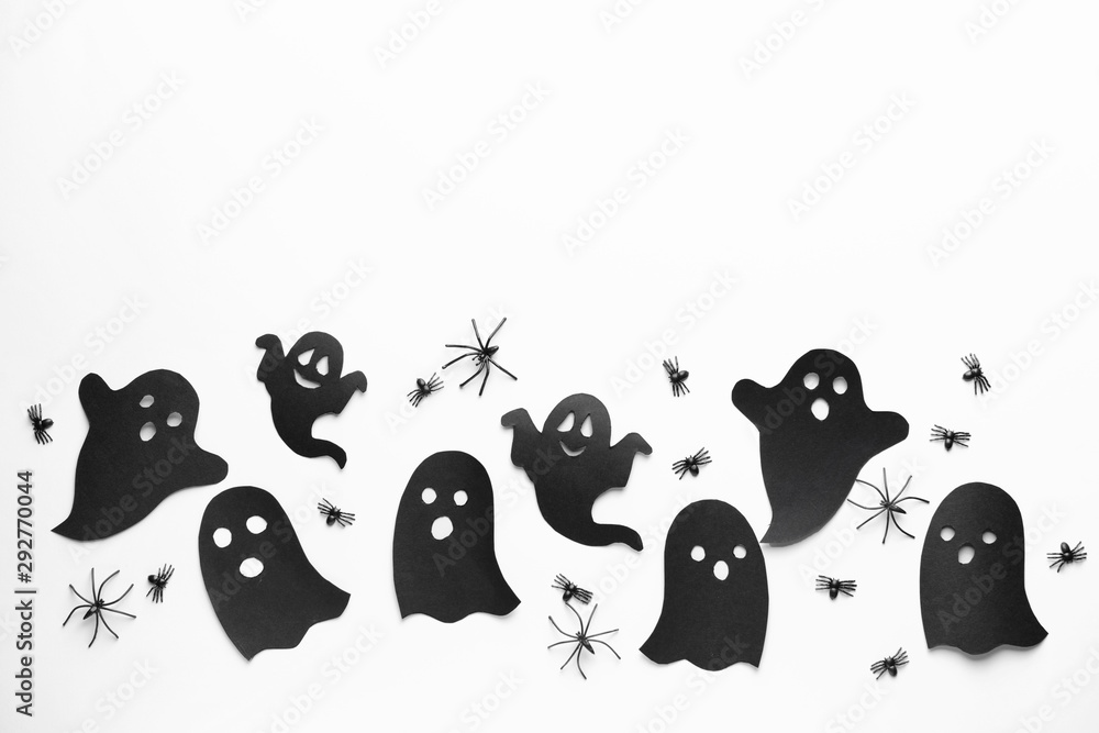 Composition with Halloween decor on white background
