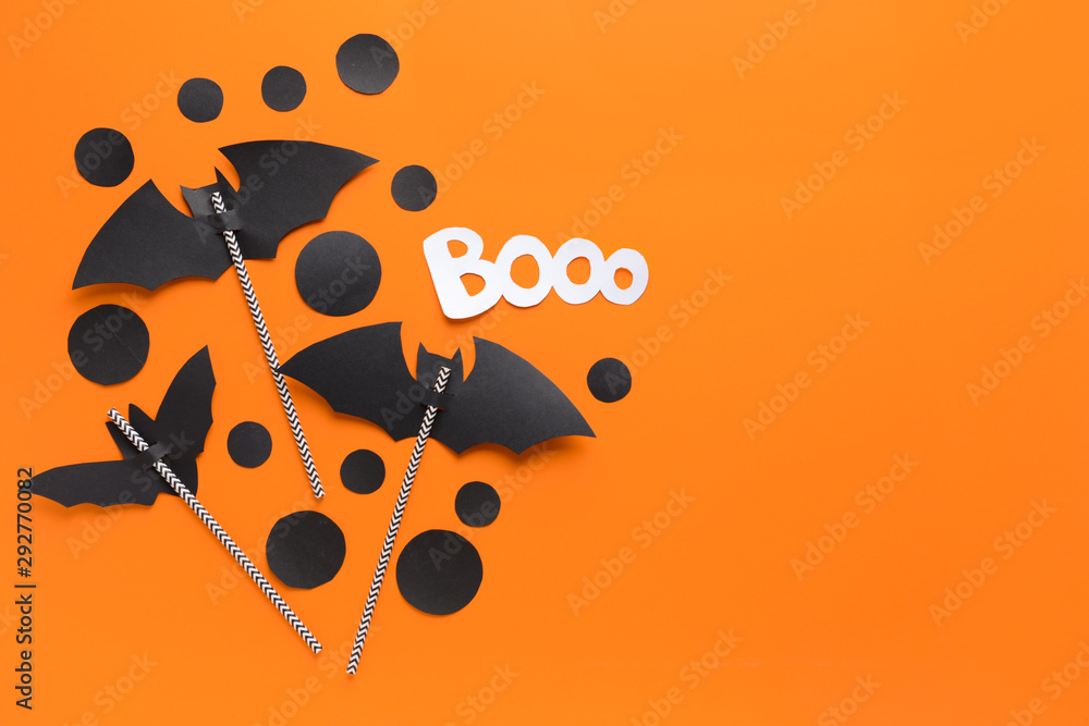 Composition with Halloween decor on color background