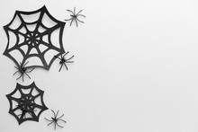 Paper Web And Spiders As Decor For Halloween Party On White Background