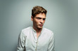 © phoenix021 - Serious teenager in white shirt, fashion studio shot