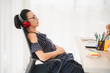 Calm attractive woman feeling relaxed in office home, peaceful mindful businesswoman leaning back on chair with eyes closed, meditating at work, taking deep breath to relax, no stress at workplace.