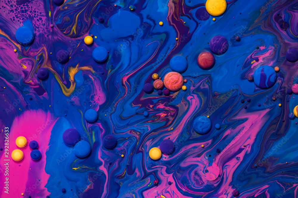 Acrylic paint balls abstract texture. Pink, blue and yellow liquids mix. Creative multicolor background. Bright colors fluid, flowing wallpaper design. Mixed pigments blue backdrop. - obrazy, fototapety, plakaty 