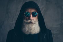 Close-up Portrait Of His He Nice Well-groomed Attractive Focused Peaceful Calm Bearded Gray-haired Man Wearing Round Blue Violet Specs Life Dream Isolated On Concrete Industrial Wall Background