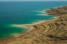 Dead Sea Aerial Landscape Photography From Above With View On Shore Line Cliff With White Waterfront From Salt