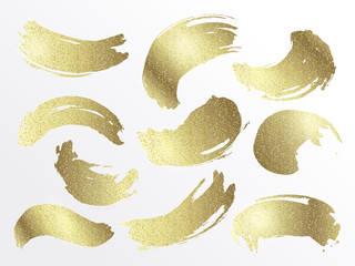 Set of vector gold brush strokes with glitter