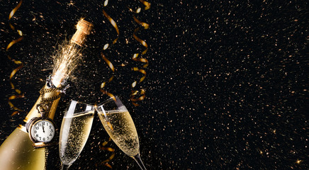New year party concept with a exploding champagne bottle