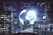 © peshkova - Financial graph on night city scape with tall buildings background multi exposure. Analysis concept.