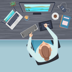 Canvas Print - workspace top view. freelance office table and manager or freelancer working at computer sitting at 