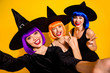 © deagreez - Live video report from disco masquerade. Closeup photo of cheerful cool red lipstick blinking beautiful carefree magic bloggers taking selfie orange blue violet wigs isolated vibrant color background