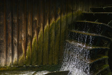 Working Watermill Wheel With Falling Water In The Village