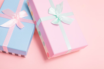 Sticker - gifts with bows on a pink background