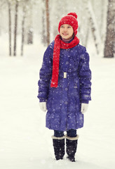 Wall Mural - cute girl on a walk in the winter. teen outdoors.