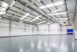 © Ian Luck - An interior of a large, empty warehouse
