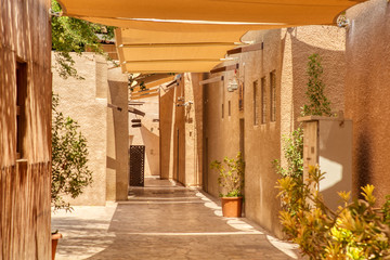 Old Dubai. Traditional Arabic streets in historical Al Fahidi district, Al Bastakiya. Dubai, United Arab Emirates.