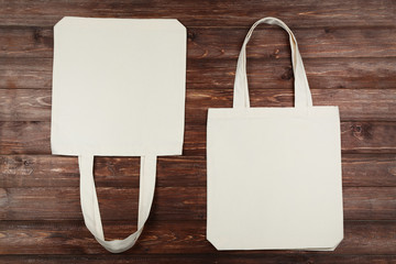 Poster - White cotton eco bags on brown wooden table